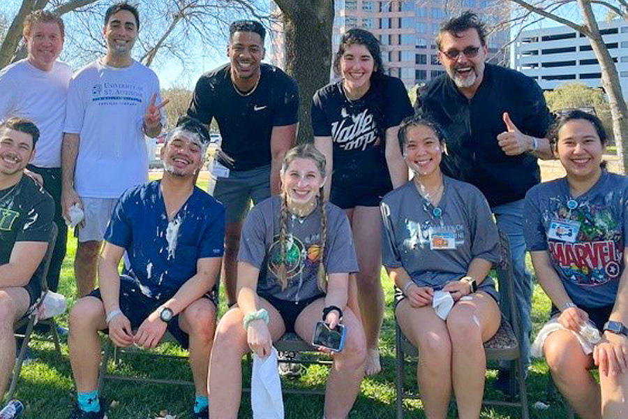 SPTA Dallas students “get pied” at a March fundraiser for the United Nations International Children’s Emergency Fund.