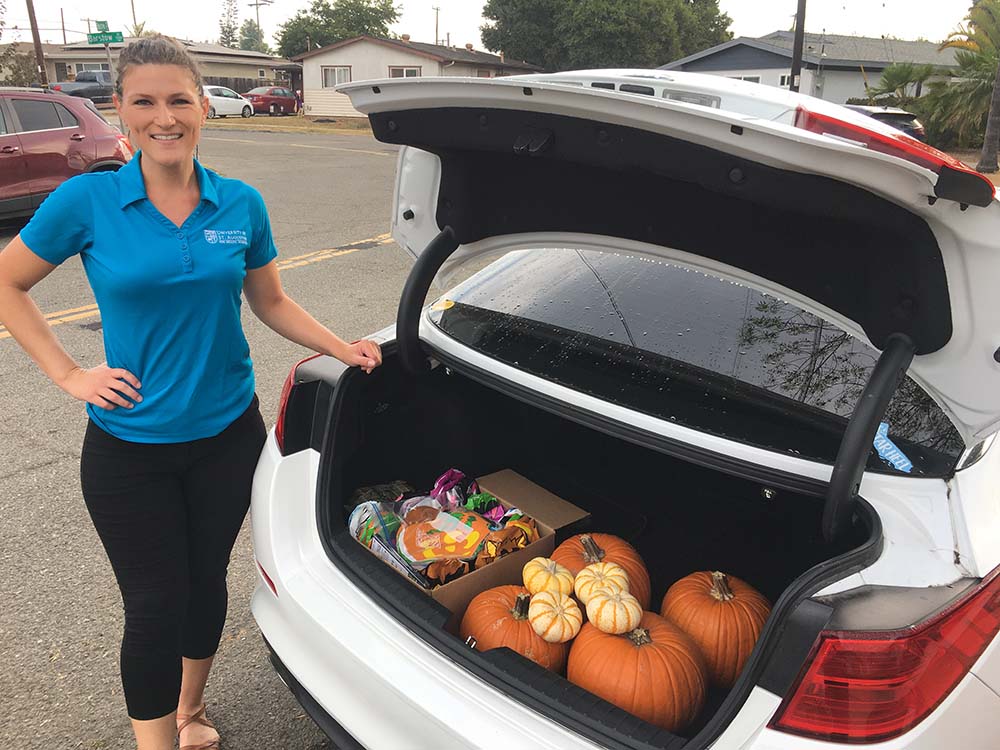 SOTA San Marcos student brings pumpkin-carving supplies to Fisher House San Diego in October 2021.