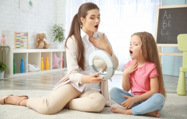 speect therapist working with child
