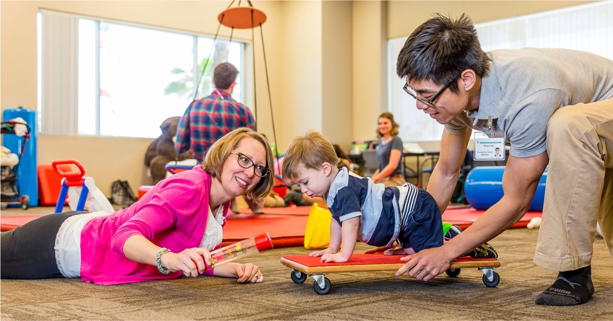 pediatric occupational therapist working with child