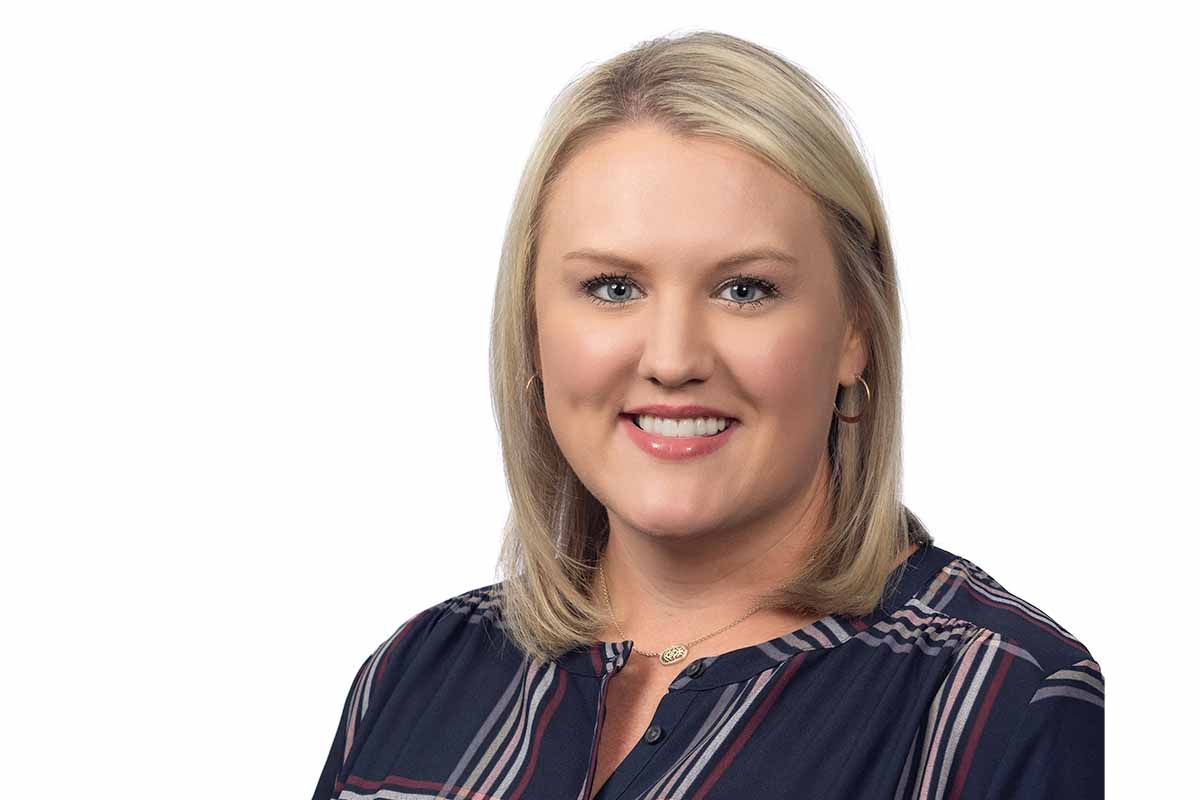 Portrait of Ashlee Loewen, DNP, APRN, FNP-C, Assistant Program Director of Nursing at the University of St. Augustine for Health Sciences (USAHS) and Medical Advisory Committee Chair at Mission House