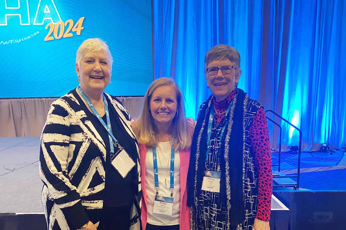 R. Martin with two fellow Texas SCF Specialists
