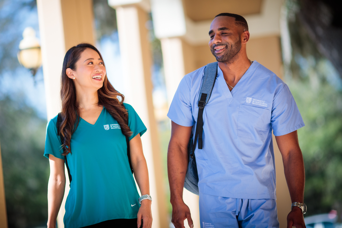 Nurses standing next to each other. 